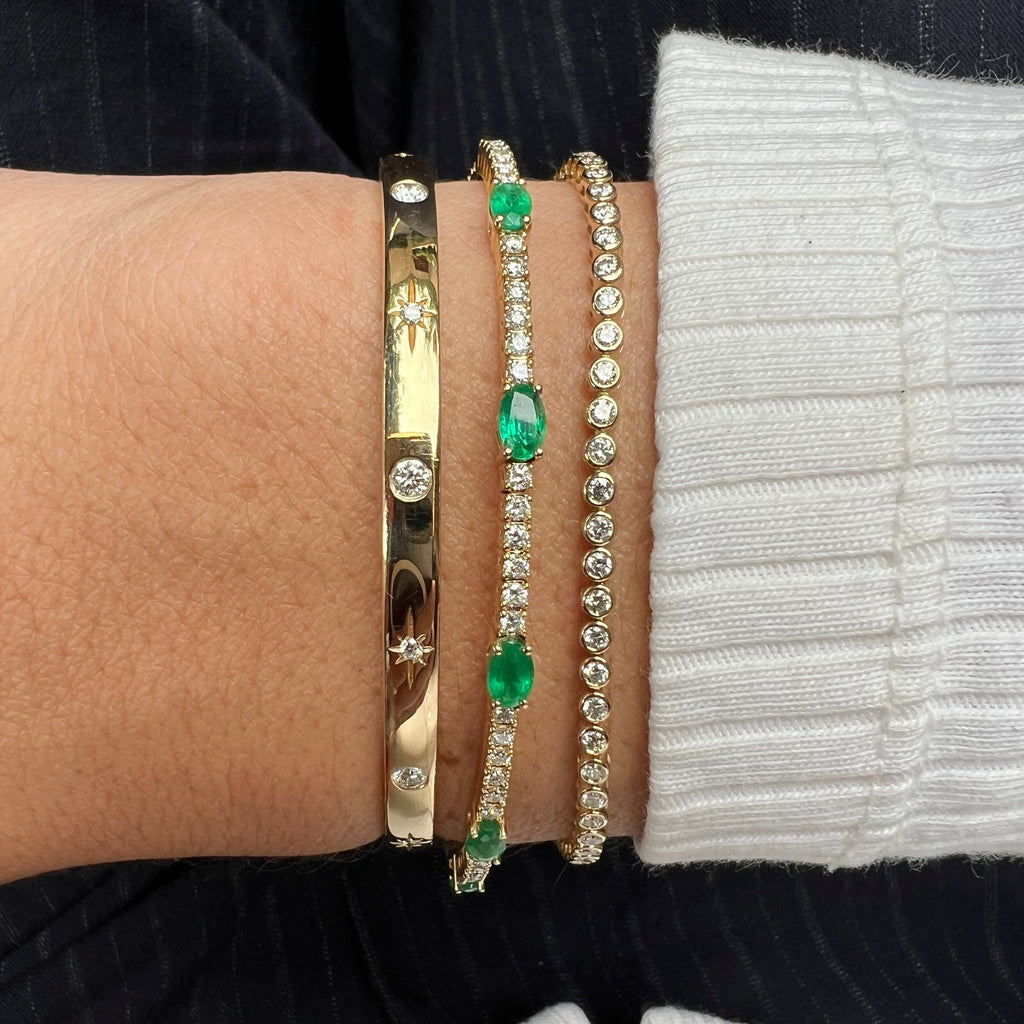 Pulsera Tennis Flexible de Esmeraldas y Diamantes en Oro 14k