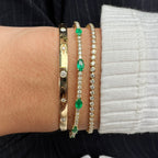 Pulsera Tennis Flexible de Esmeraldas y Diamantes en Oro 14k